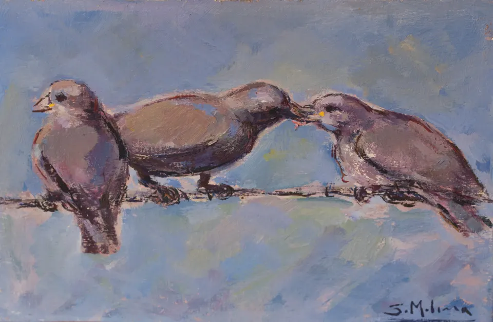 Three birds on a wire