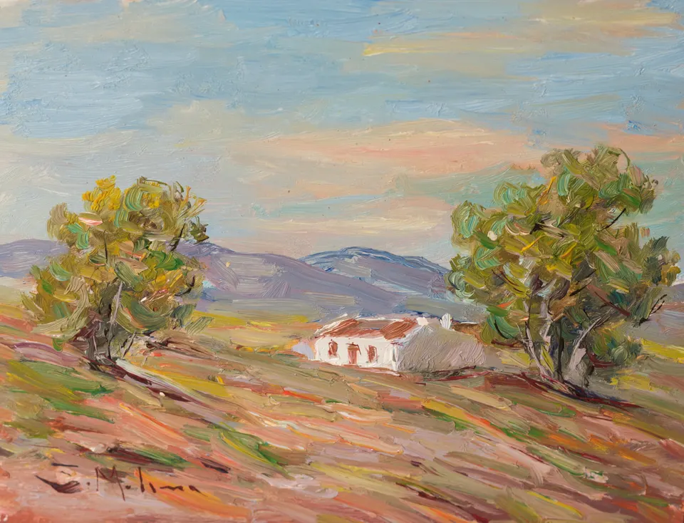 Farmhouse between two trees