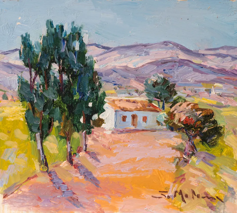 Farmhouse behind the trees