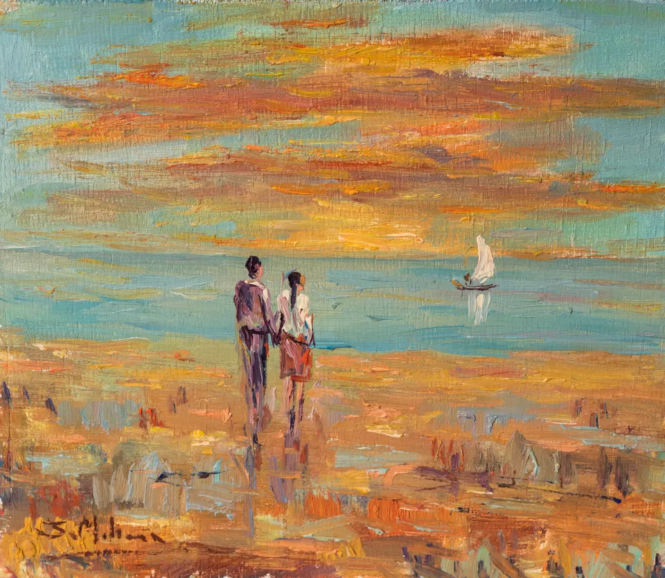 Couple facing the sea