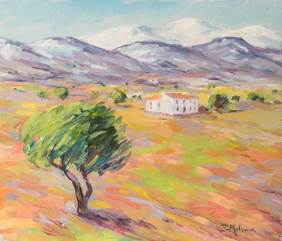 Farmhouse below white peaks