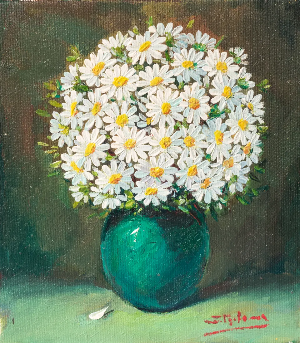 Daisies in a turquoise vase