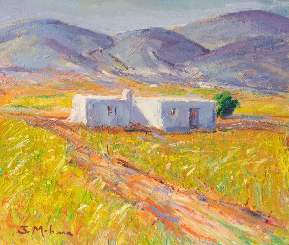 Farmhouse in a green field