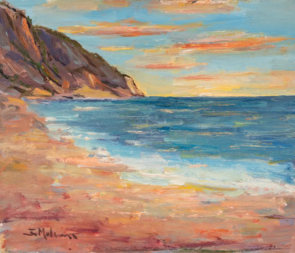 Headland above pink sand